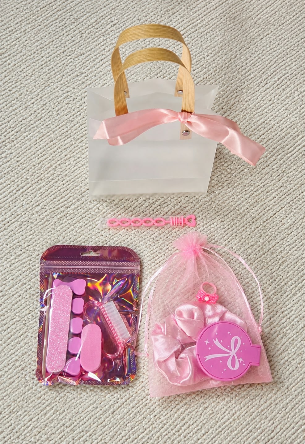 Luxe Party Bag contents with spa-themed treats and accessories from The Little Luxe Co.
